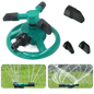 Blue Rotating Garden Sprinklers Watering Grass